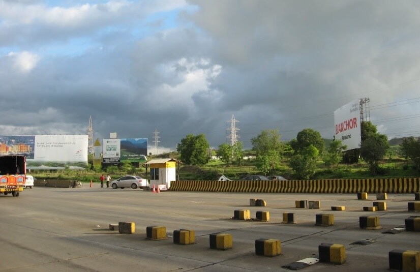 Khalapur_a road that has a lot of trucks on it